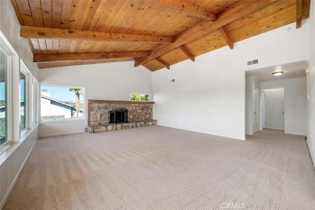 unfurnished living room featuring beamed ceiling, carpet floors, high vaulted ceiling, and a fireplace