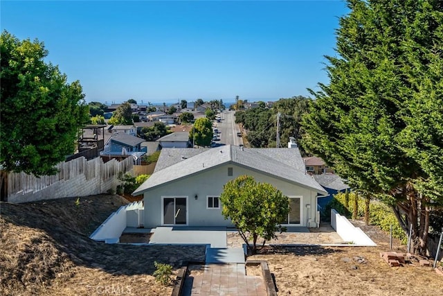 back of property with a patio area