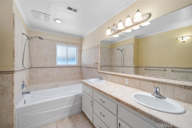 bathroom featuring tile patterned floors, vanity, ornamental molding, and tile walls