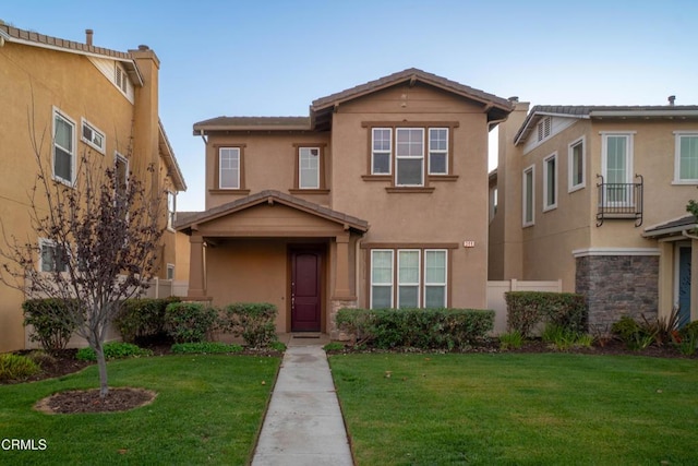 view of front of home with a front yard