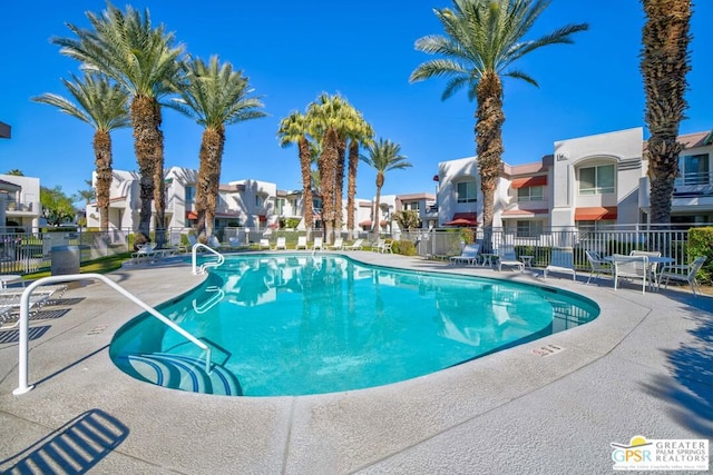 view of swimming pool featuring a patio