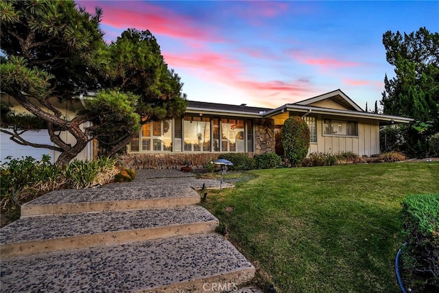 4614 La Subida Pl, Tarzana, CA 91356 - single story home featuring stone siding, board and batten siding, and a yard