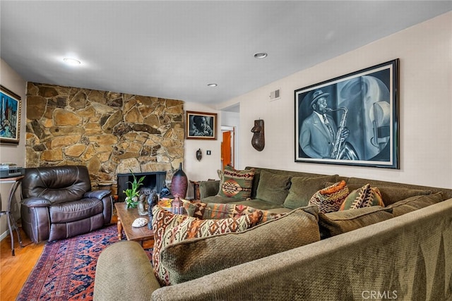 4614 La Subida Pl, Tarzana, CA 91356 - living area featuring wood finished floors and a stone fireplace