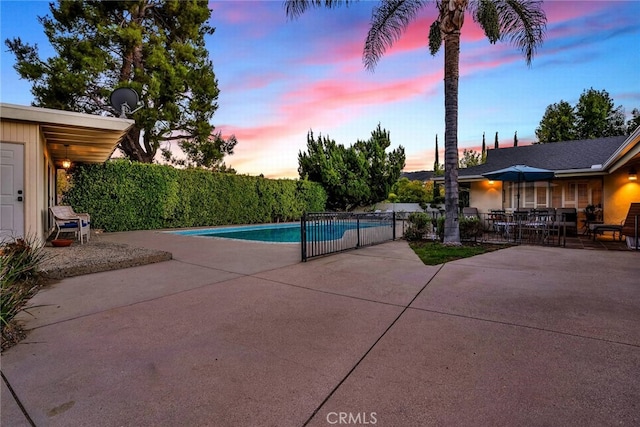 4614 La Subida Pl, Tarzana, CA 91356 - pool at dusk with a patio area