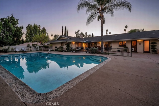 4614 La Subida Pl, Tarzana, CA 91356 - pool at dusk with a patio area