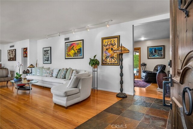 4614 La Subida Pl, Tarzana, CA 91356 - living area with track lighting and wood finished floors