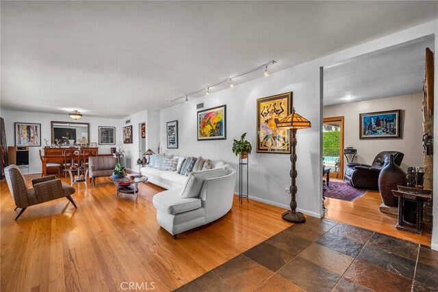 4614 La Subida Pl, Tarzana, CA 91356 - living area with rail lighting and wood finished floors