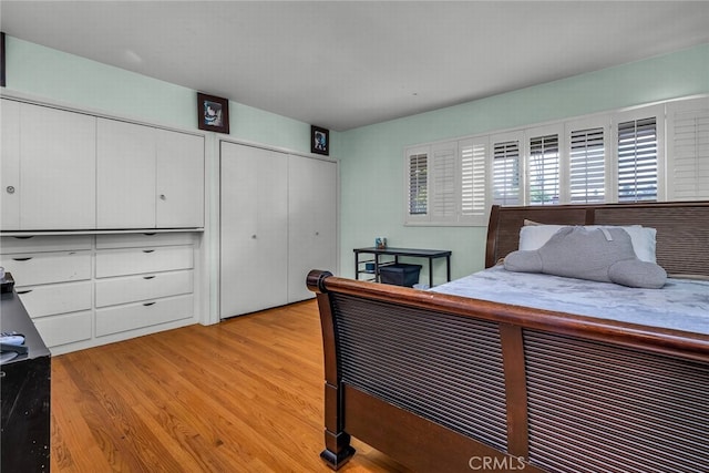 4614 La Subida Pl, Tarzana, CA 91356 - bedroom featuring light wood-style floors and multiple closets