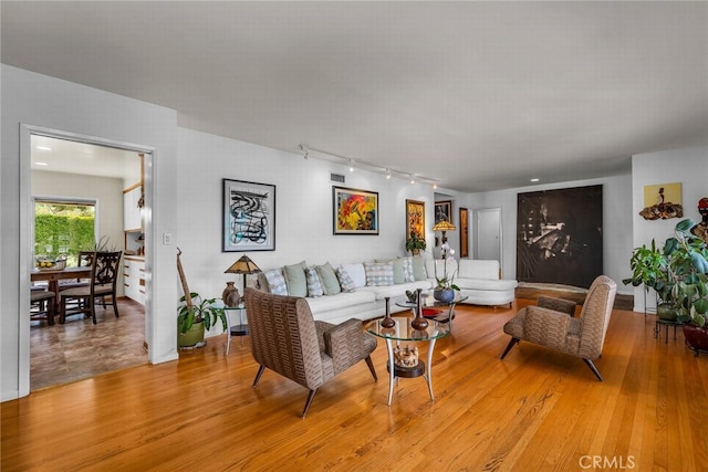 4614 La Subida Pl, Tarzana, CA 91356 - living area with track lighting and light wood finished floors