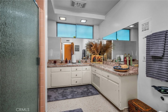 4614 La Subida Pl, Tarzana, CA 91356 - bathroom featuring vanity, a stall shower, and speckle patterned floor