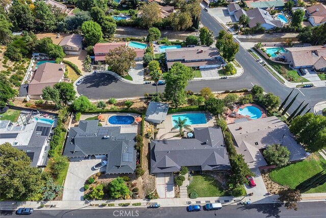 4614 La Subida Pl, Tarzana, CA 91356 - aerial view of property and surrounding area featuring a pool area and nearby suburban area