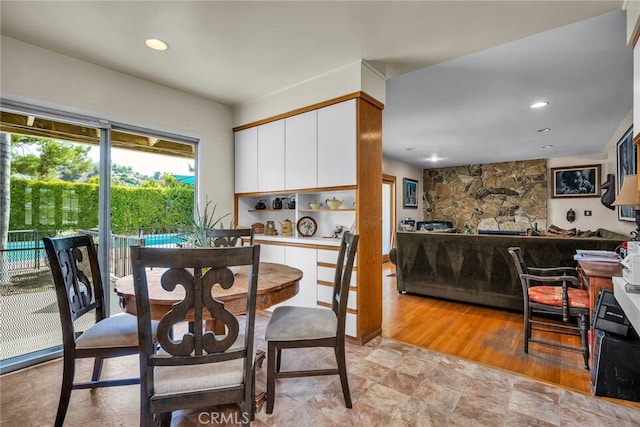 4614 La Subida Pl, Tarzana, CA 91356 - dining room with stone finish flooring and recessed lighting
