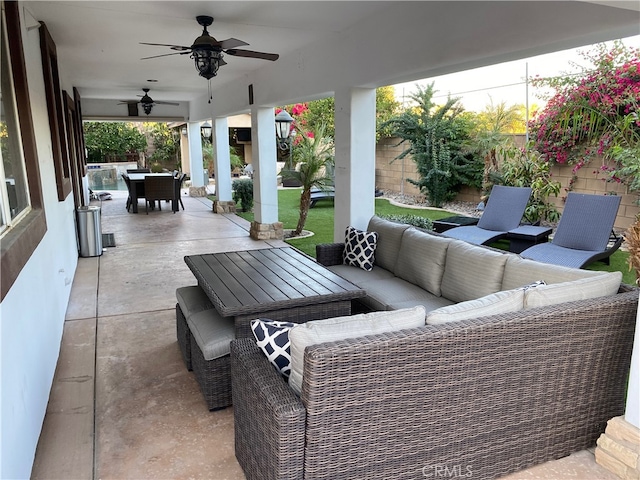 view of patio / terrace featuring an outdoor living space and ceiling fan