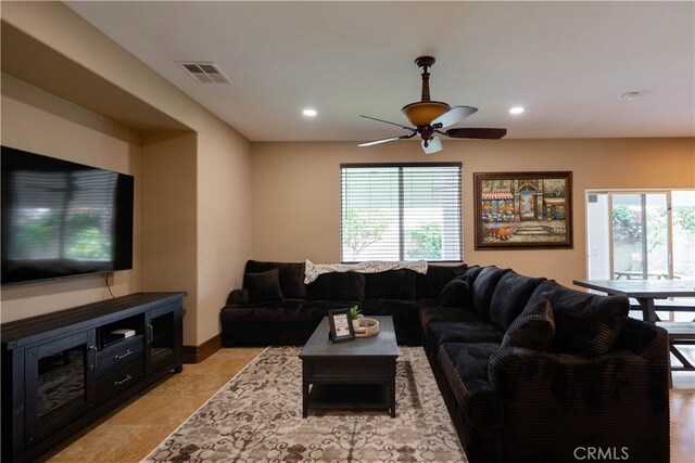living room featuring ceiling fan