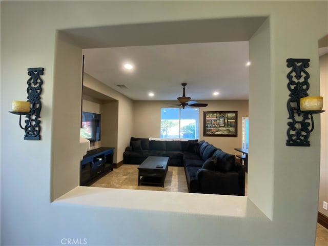 living room with ceiling fan