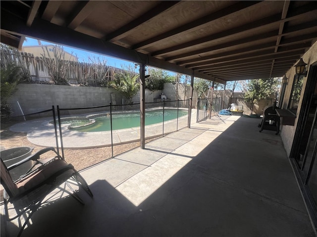 view of patio featuring a fenced in pool