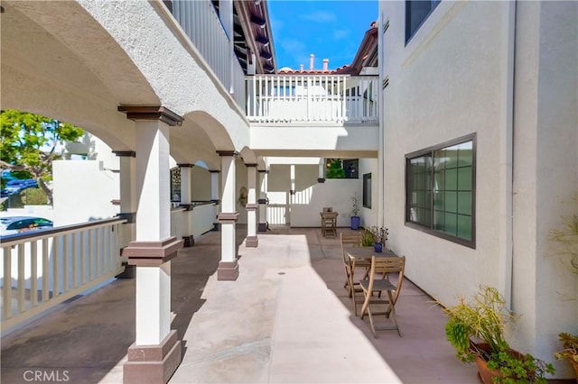 view of patio / terrace with a balcony