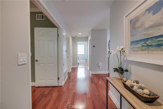 corridor featuring wood-type flooring