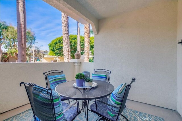 view of patio / terrace featuring a balcony