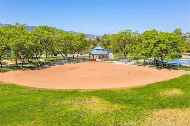 view of property's community with a mountain view and a gazebo