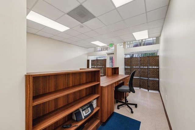 office with a paneled ceiling