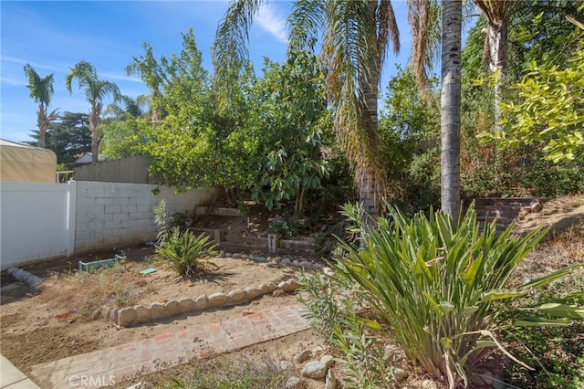 view of yard featuring fence
