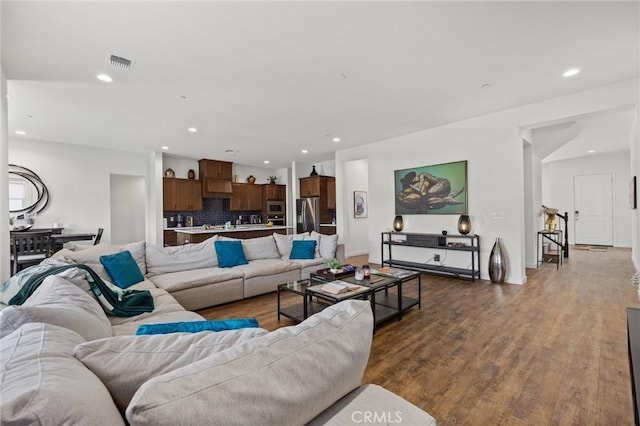 living room featuring dark hardwood / wood-style flooring