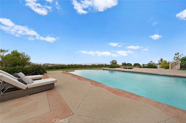 view of pool with a patio area