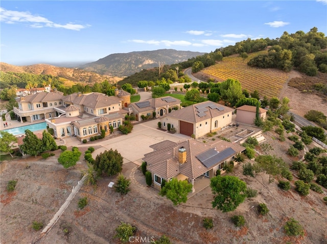 aerial view featuring a mountain view