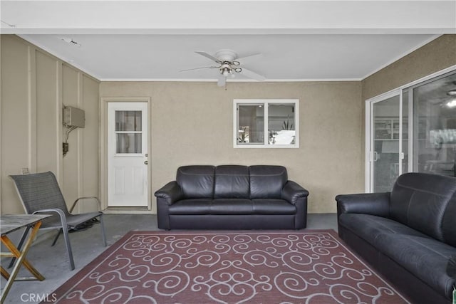 living room with ceiling fan