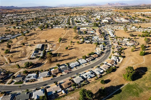 birds eye view of property featuring a mountain view