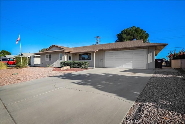 single story home featuring a garage