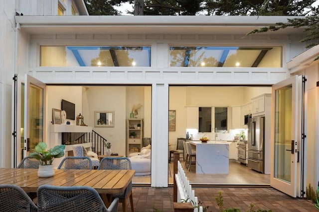 rear view of house featuring a patio area