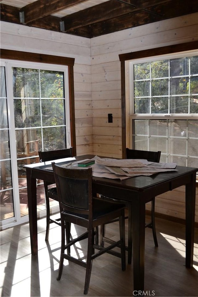 2204 Birchwood Way, Pine Mountain Club, CA 93222 - dining area featuring plenty of natural light, wood walls, beamed ceiling, and wood finished floors