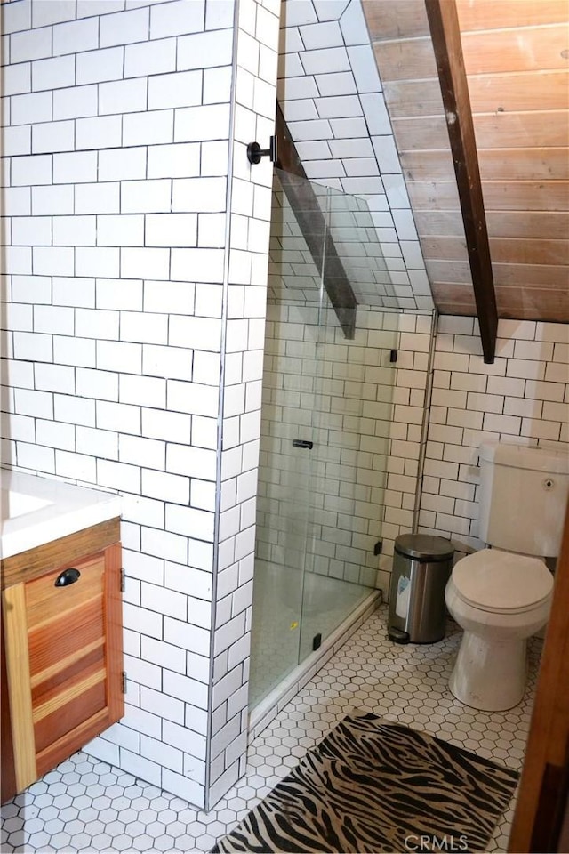 2204 Birchwood Way, Pine Mountain Club, CA 93222 - bathroom featuring tile walls, a shower stall, toilet, vanity, and wood ceiling with exposed beams