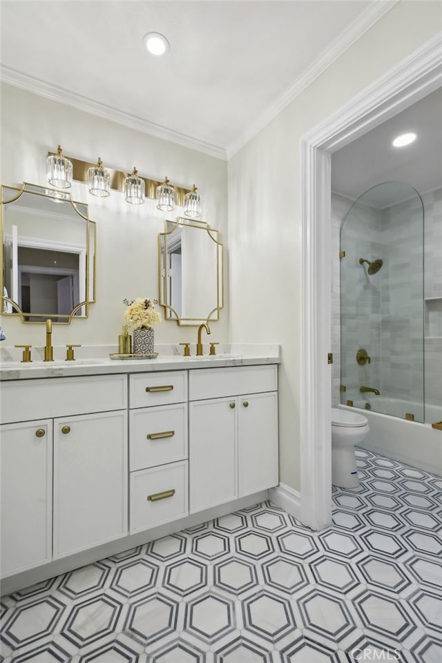 full bathroom with vanity, toilet, shower / bath combination with glass door, and crown molding