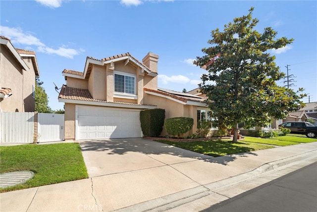 view of front facade featuring a front lawn and a garage