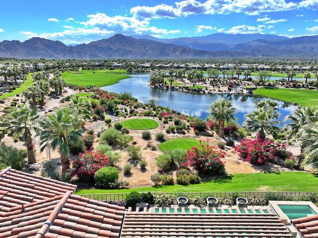 bird's eye view with a water and mountain view