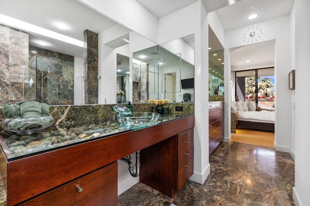 bathroom with vanity and walk in shower