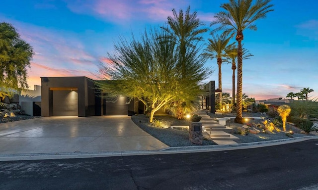 view of front of home with a garage