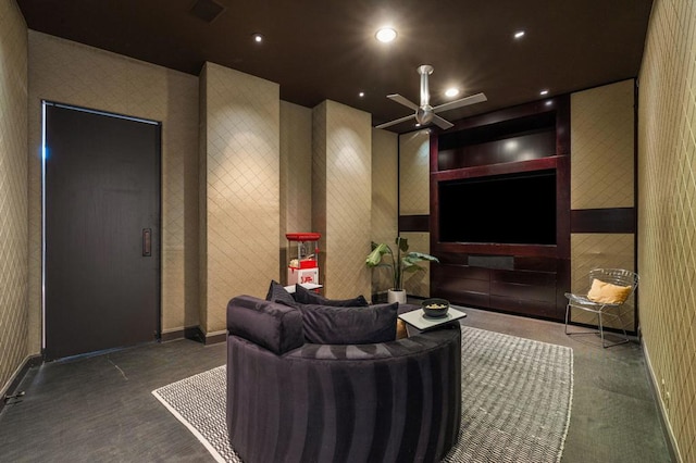 cinema room featuring ceiling fan