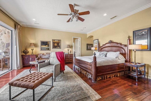 bedroom featuring ceiling fan, dark hardwood / wood-style flooring, and ornamental molding