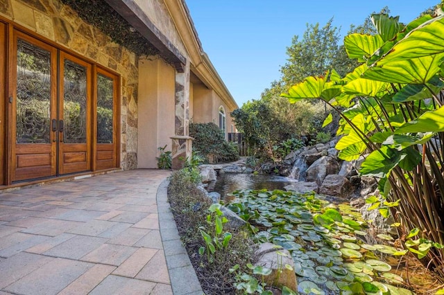 view of exterior entry with french doors