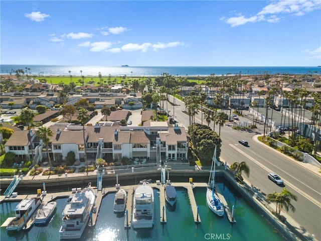 aerial view with a water view and a residential view