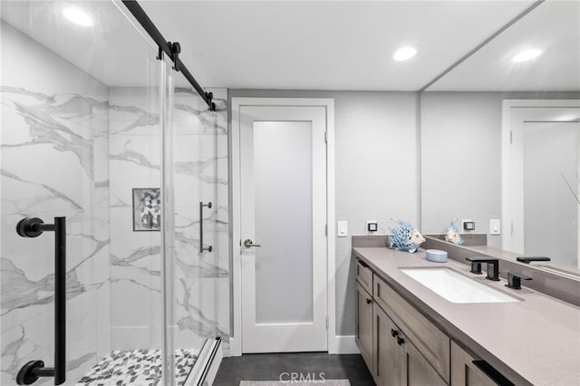 6 Kingston Ct E, Coronado, CA 92118 - bathroom with a marble finish shower, recessed lighting, vanity, and a baseboard heating unit