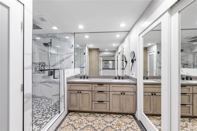 6 Kingston Ct E, Coronado, CA 92118 - bathroom with a marble finish shower, recessed lighting, double vanity, and tile patterned floors