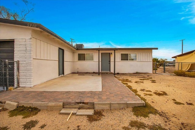 back of house featuring a patio