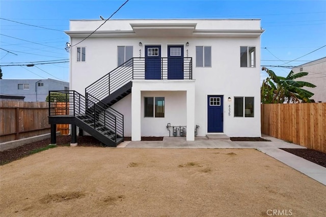 view of front of house with a patio