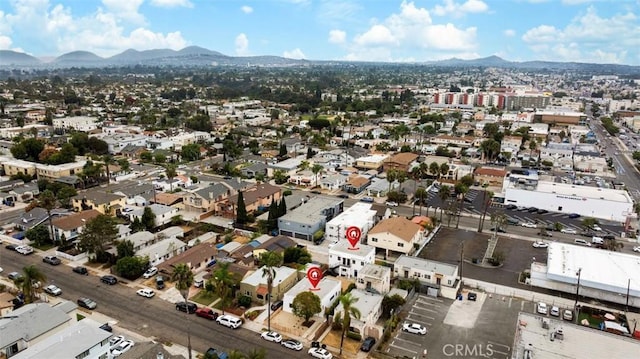 drone / aerial view featuring a mountain view