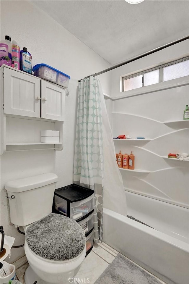 bathroom with shower / bath combo with shower curtain